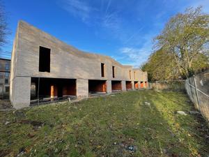 Achtergevel van nieuwbouw project bestaande uit 7 woningen te Brugge